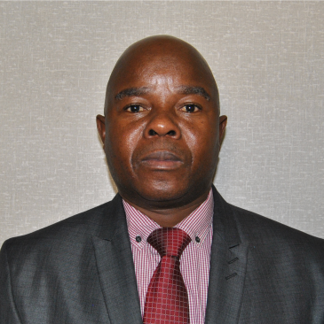 Clinic Manager: He holds an MBA (ZOU), a Postgraduate Diploma in Health Services Management (Harare Polytechnic), and a BSc Hons in Politics and Administration (U.Z). With the clinic since 2001, he previously served as a Health Services Administrator in the Ministry of Health at district, provincial, and head office levels from 1996.